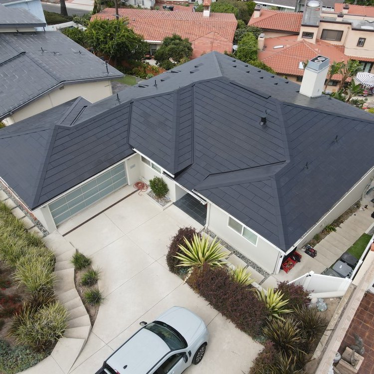 Tesla Solar Roof on a single-storey home, aerial view